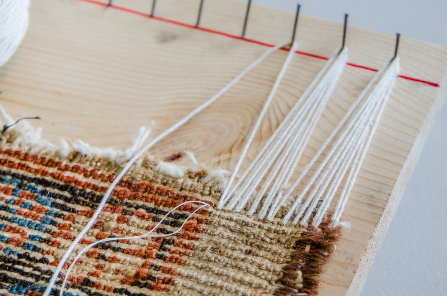 Rug fringe repairing process